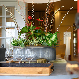 Glasses of wine on a wooden tray